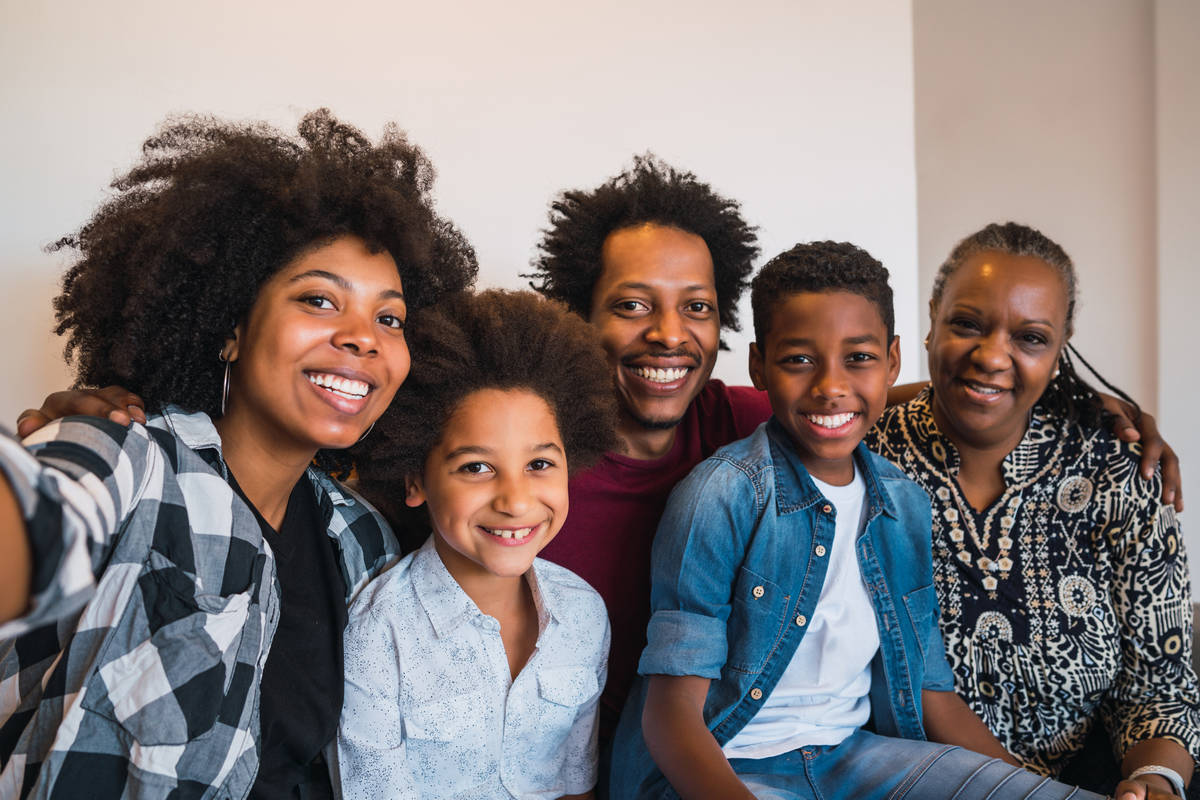 multigenerational-family-taking-selfie-at-home-275HFCG.jpeg